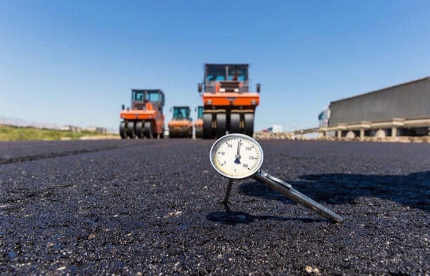 Asphalt paving and compaction with temperature testing