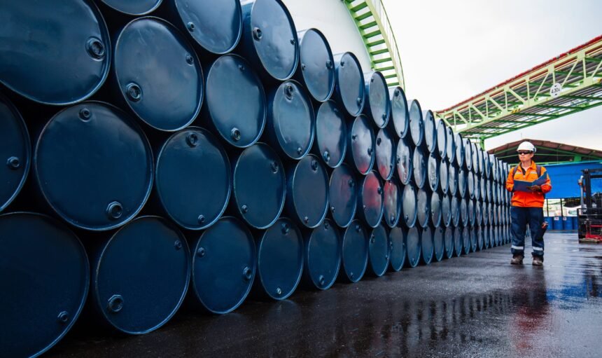 Male,Worker,Inspection,Record,Drum,Oil,Stock,Barrels,Blue,Horizontal