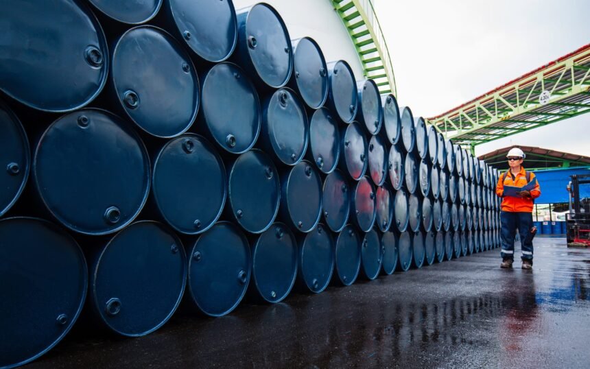 Male,Worker,Inspection,Record,Drum,Oil,Stock,Barrels,Blue,Horizontal