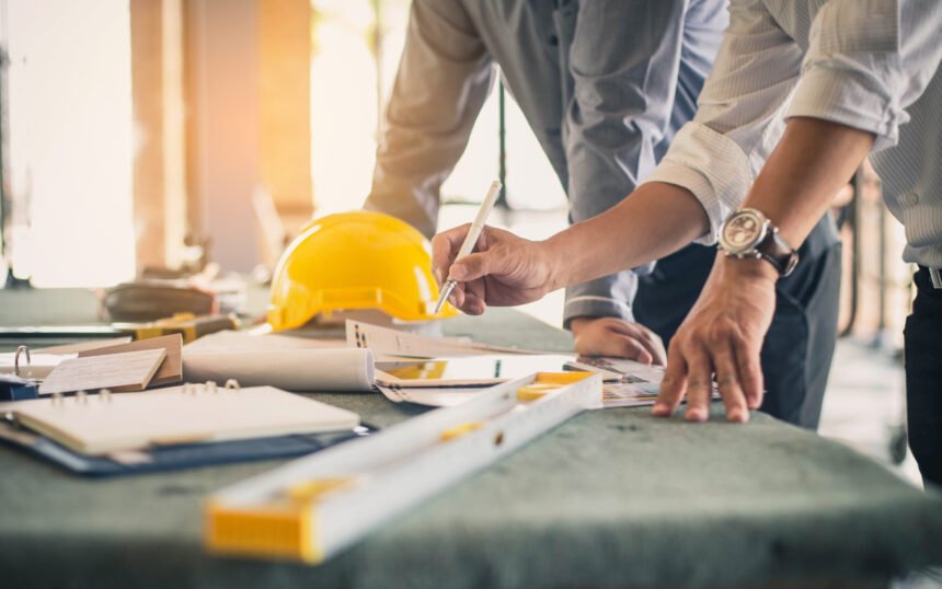 Two,Business,Man,Construction,Site,Engineer.,Engineering,Objects,On,Workplace